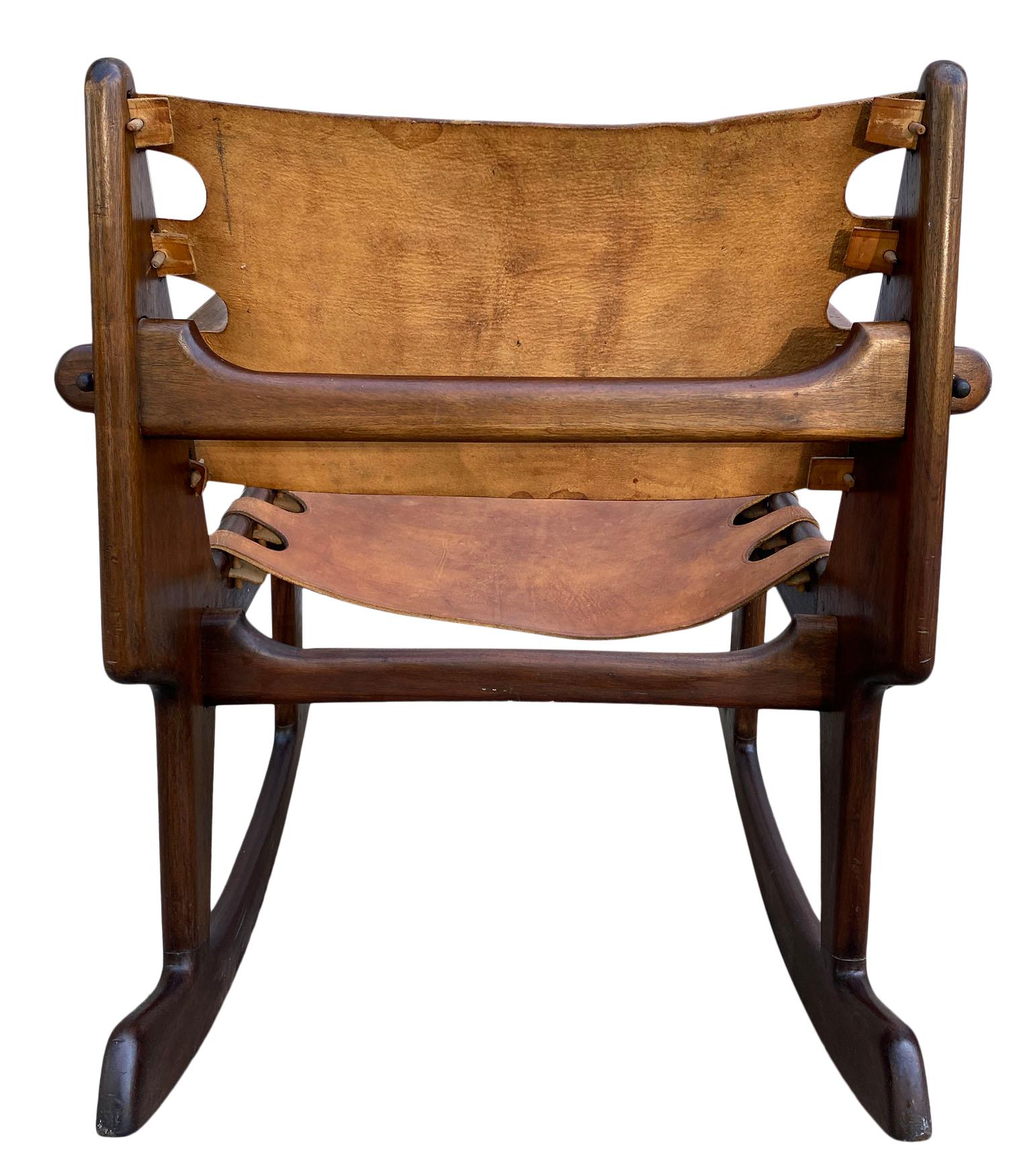 Mid-Century Modern Rose wood and leather sling rocking chair by Ecuadorian designer Angel Pazmino