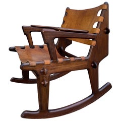 Rose wood and leather sling rocking chair by Ecuadorian designer Angel Pazmino