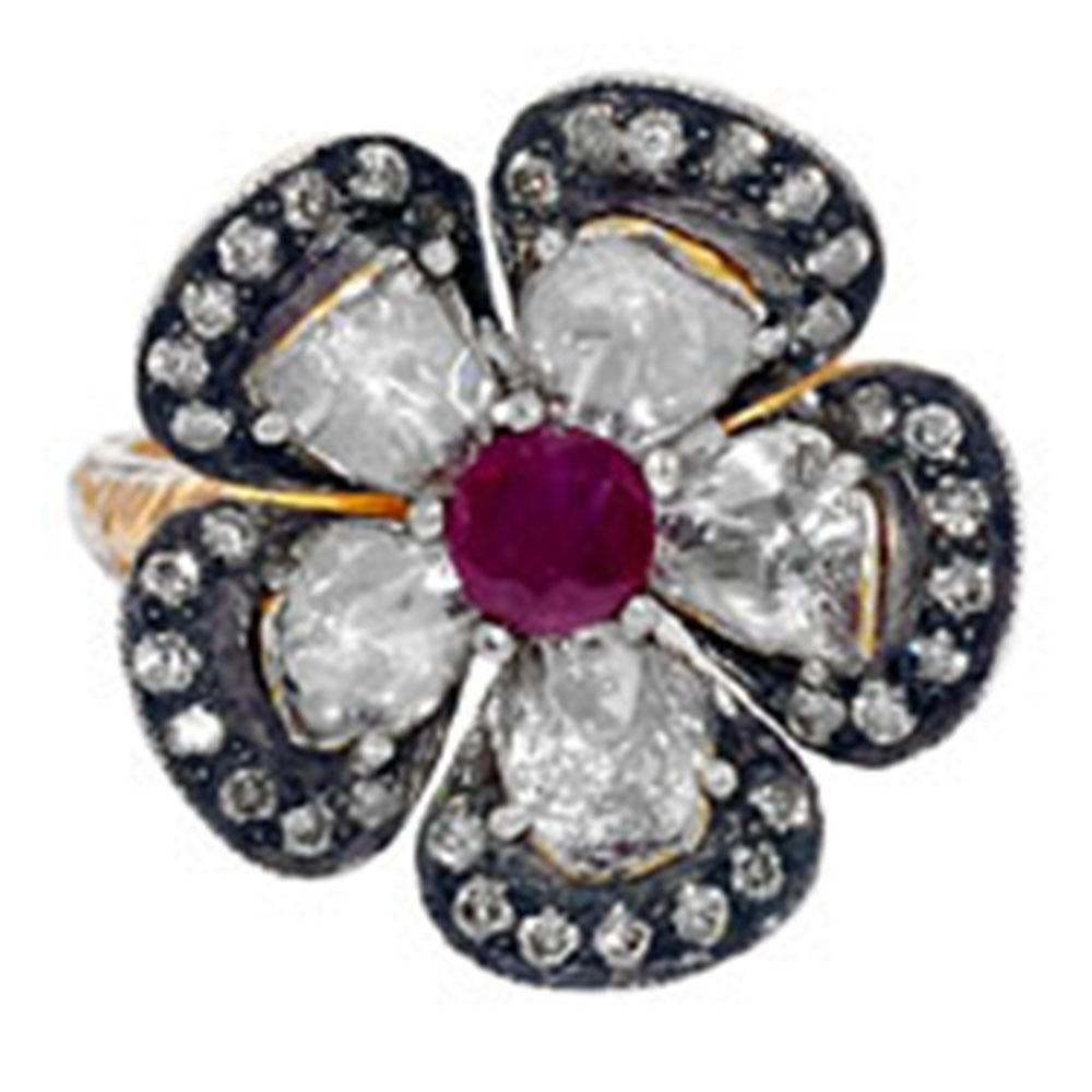 Pretty looking this rosecut diamond Flower Ring with ruby in Gold and Silver is vert charming and perfect. 

Ring Size 7 ( can be sized )

14kt gold: 3.20gms
Diamond: 1.12cts
Ruby: 0.3cts
