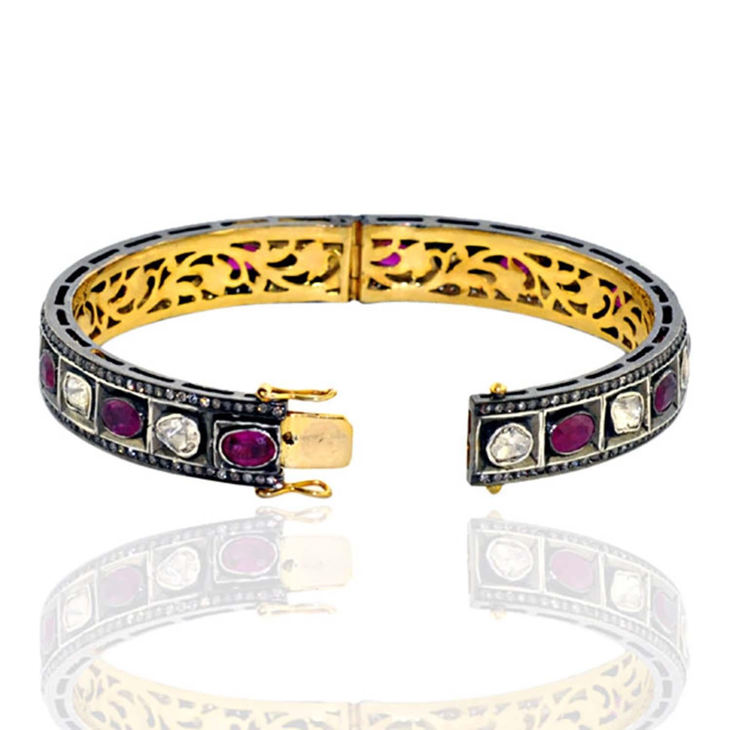 14kt:5.96gms,D:2.79cts,Sl:24.52gms RUBY:7.2Cts