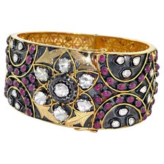 Manschette aus 14 Karat Gelbgold und Silber mit Diamanten im Rosenschliff und Rubin mit filigraner Arbeit