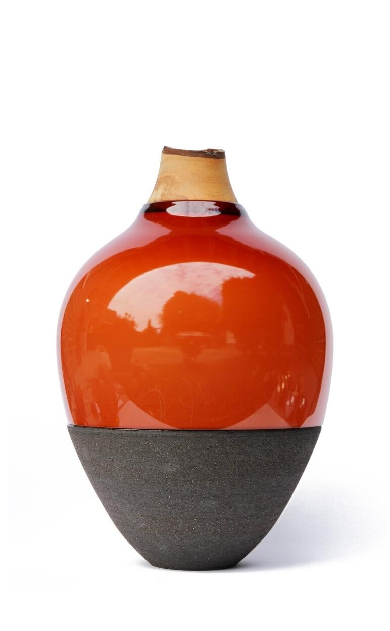 Rosehip TSV4 stacking vessel, Pia Wüstenberg.
Dimensions: D 34 x H 57.
Materials: glass, wood, ceramic.
Available in other colors.

Handmade in Europe: handblown glass (Czech Republic), ceramic (handmade in Scotland), hand turned wood