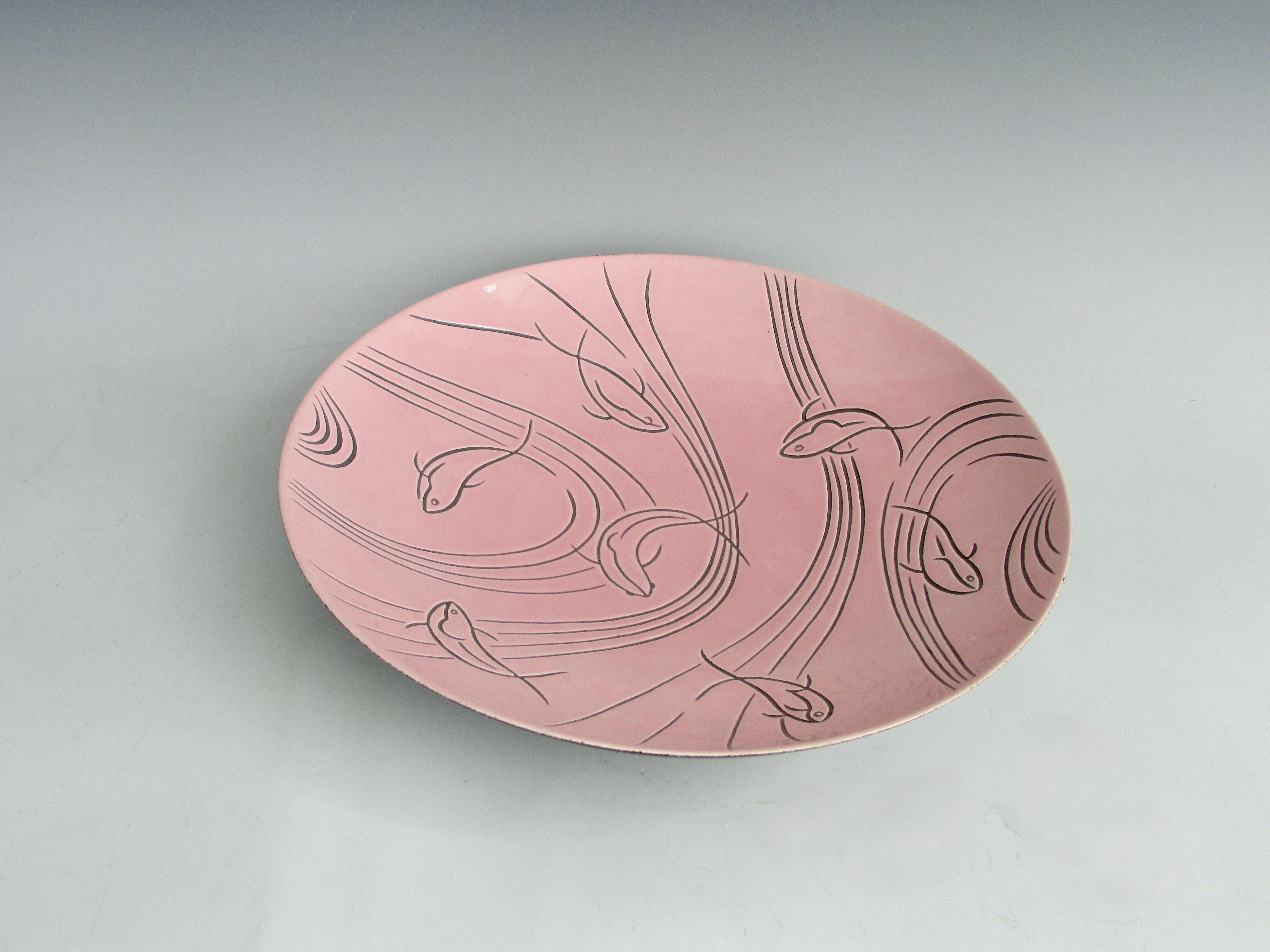 pottery with fish design