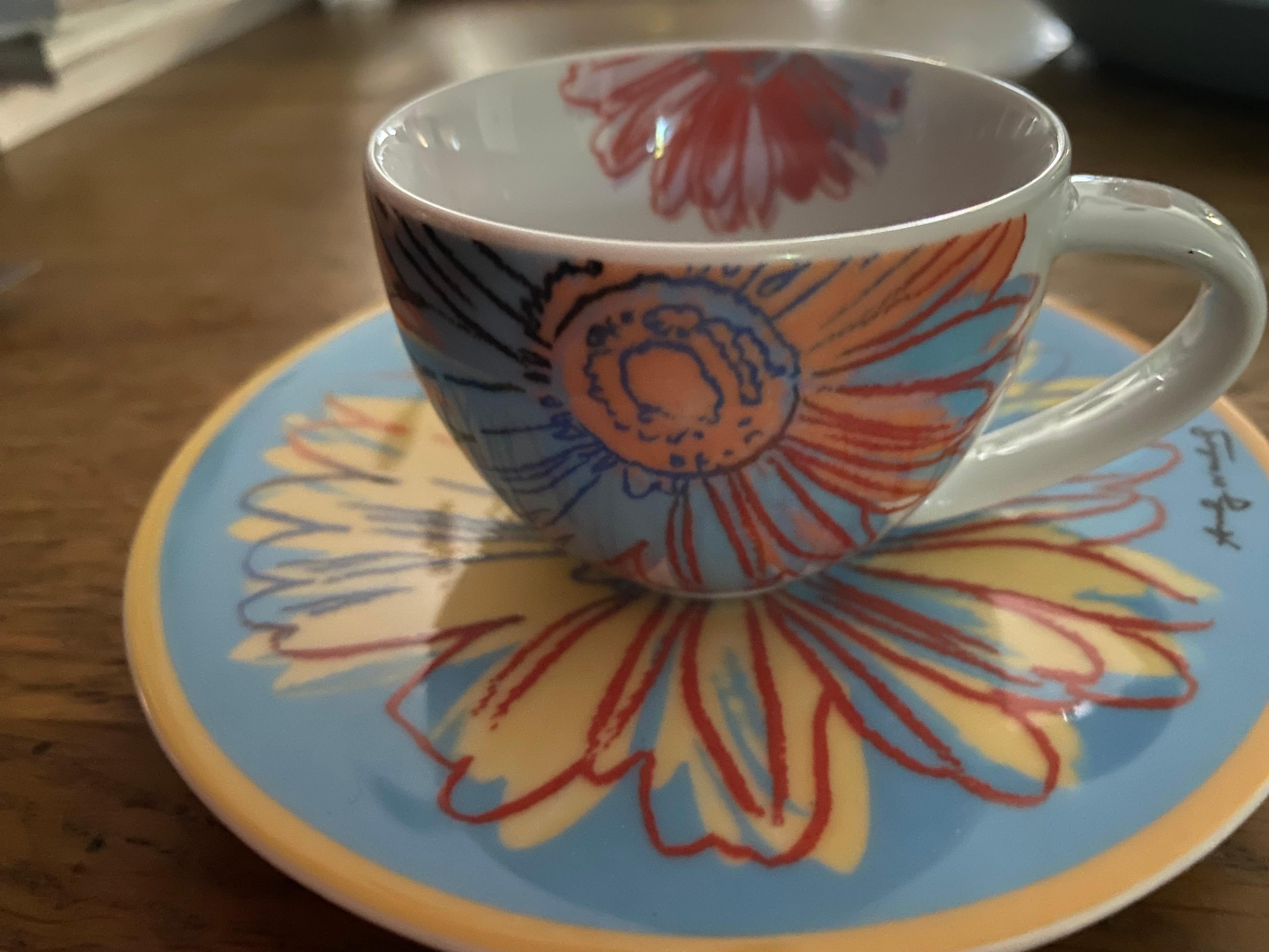 Rosenthal Studio-Line Andy Warhol Daisies espresso cup with saucer. Rosenthal Andy Warhol Daisies line---beautiful, precious collector porcelain pieces that add sparkle to any table. 
Size: cup---3 1/4