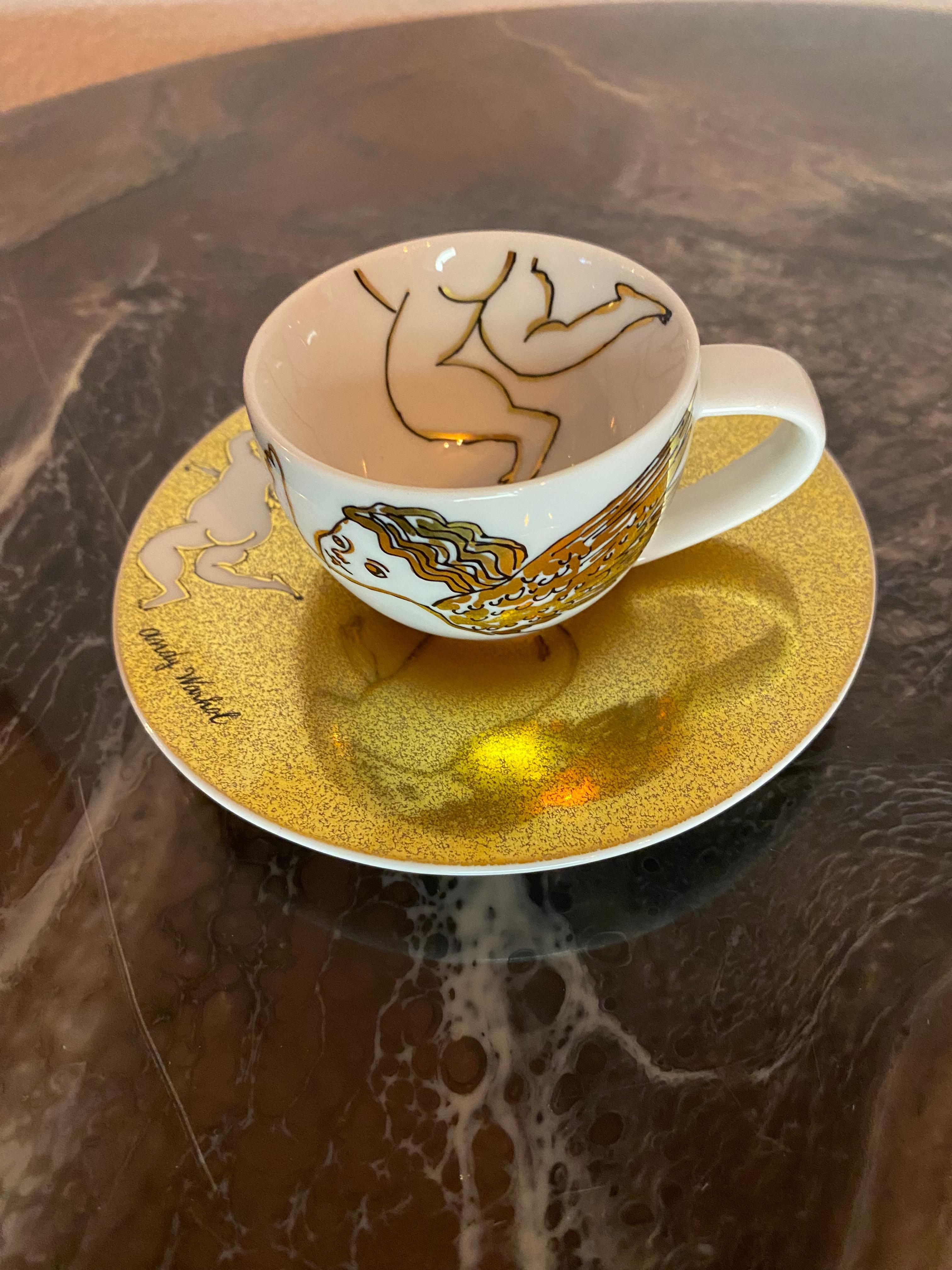 Rosenthal Studio-Line Andy Warhol christmas golden Angels espresso cup with saucer. Andy Warhol, quite possibly the greatest pop art artist of our time, loved Christmas and was known for giving his friends paintings of cupids as gifts. These