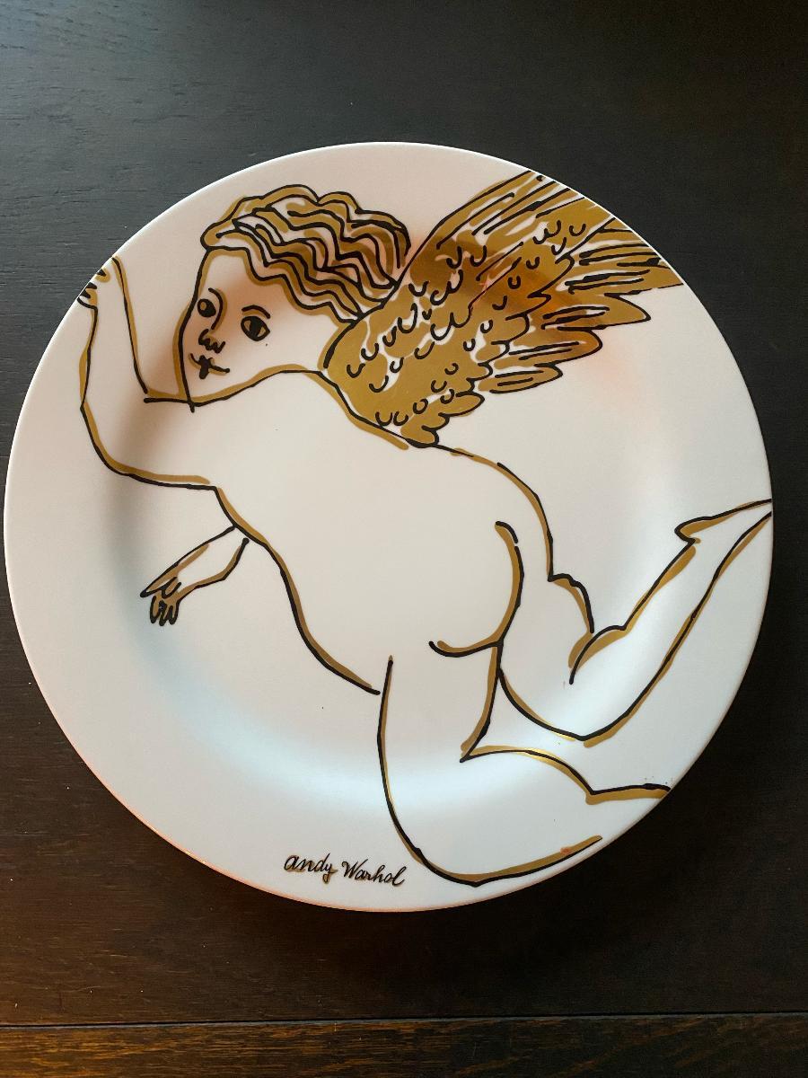 Rosenthal Studio-Line Andy Warhol Christmas Golden Angels plate. Andy Warhol, quite possibly the greatest pop artist of our time, loved Christmas and was known for giving his friends paintings of cupids as gifts. These particular cupids now grace