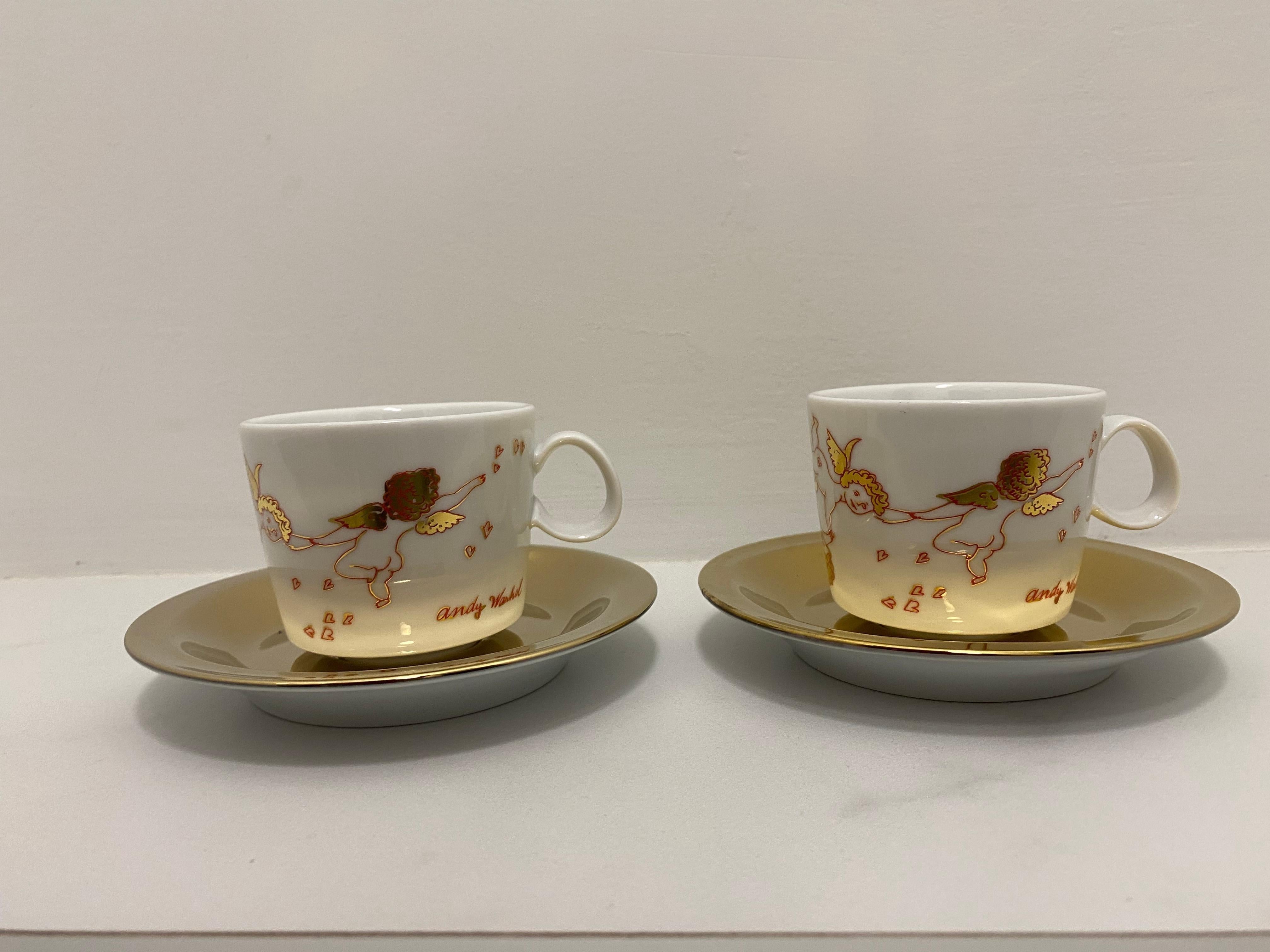 Rosenthal Studio-Line Andy Warhol Weihnachten goldenen Engeln Espressotasse mit Untertasse. Andy Warhol, der wohl größte Pop-Art-Künstler unserer Zeit, liebte Weihnachten und war dafür bekannt, dass er seinen Freunden Bilder von Amoretten schenkte.