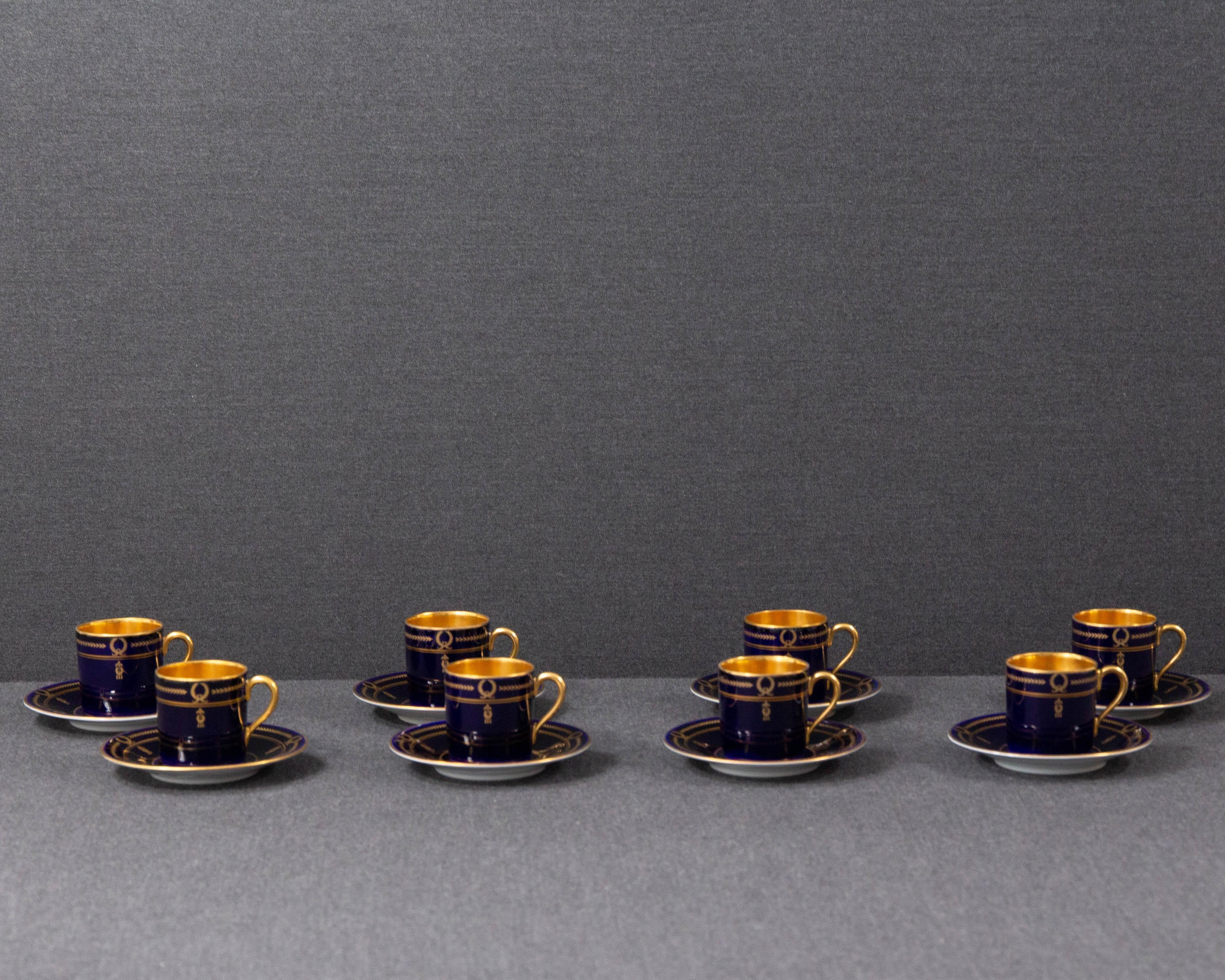 A set of eight Rosenthal D1245 pattern demitasse cups.

The set was made by Rosenthal in the 1950s. It was decorated with beautiful deep cobalt blue and ample gilding. The set was sold at and marked with the logo of the luxury dinnerware retailer
