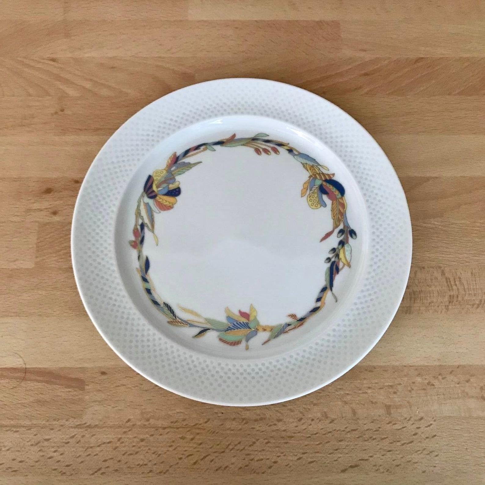 Beautiful dessert plates of the finest white porcelain from the famous manufactory Rosenthal.

Germany. 

The price per set of 3 plates.

Plates have embossed edge surface and delicate floral decoration.

In excellent condition, no chips,