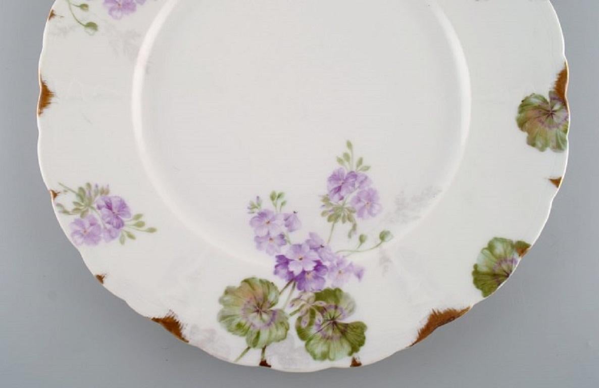 Rosenthal, Germany, Eight Iris Dinner Plates in Hand-Painted Porcelain In Excellent Condition In Copenhagen, DK