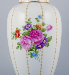 Rosenthal, Germany, large porcelain lidded jar hand-painted with flower bouquets