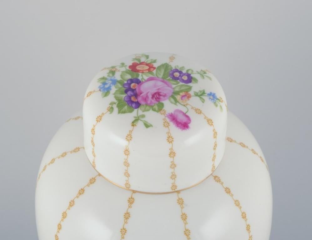Hand-Painted Rosenthal, Germany, large porcelain lidded jar hand-painted with flower bouquets For Sale