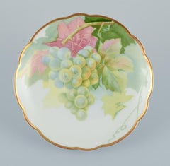 Rosenthal, Germany. Set of six porcelain plates with various fruit motifs. 1930s