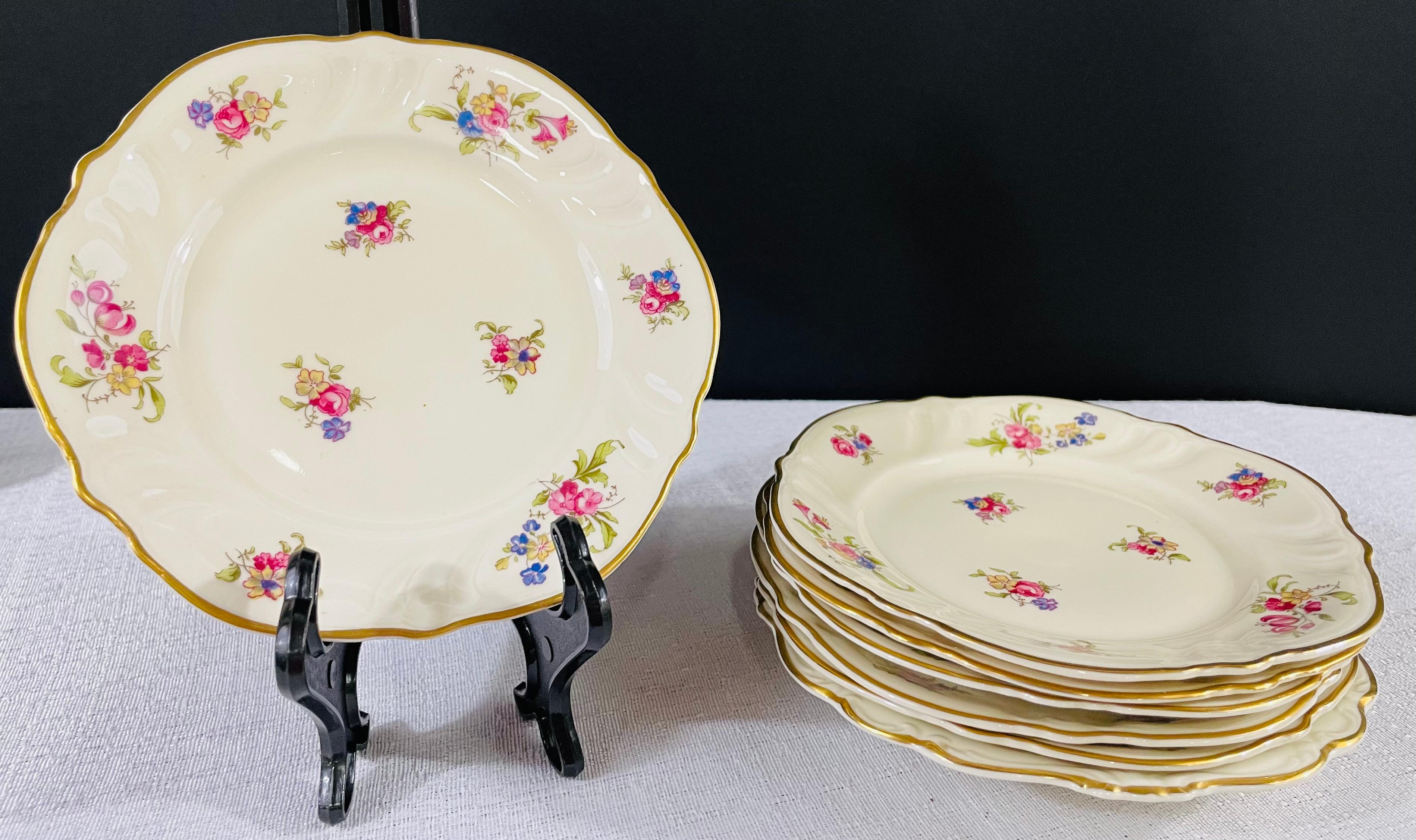1930's Rosenthal Kronach Viktoria Lombul gold trim German porcelain large coffee set of 27 pieces decorated in a floral prink rose motif on white. Each piece is signed Rosenthal Kronach Viktoria in the bottom with the Rosenthal symbol. 

The set