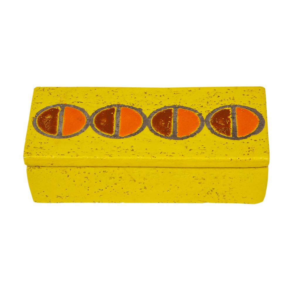 Rosenthal netter box, ceramic, yellow and orange discs, signed. Small scale yellow glazed lidded box decorated with a pattern of light and dark orange half circles. Retains original paper label on the underside, which reads: Made in Italy for