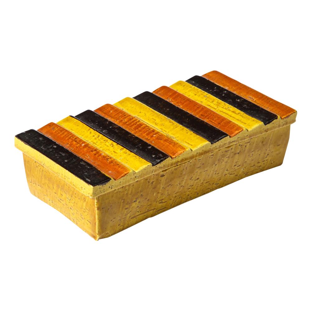 Boîte à filets Bitossi pour Rosenthal, céramique, rayures, orange, noir et jaune, signée. Boîte à couvercle en céramique de petite taille décorée de planches angulaires, émaillée d'un motif alterné d'orange, de noir et de jaune. Conserve l'étiquette