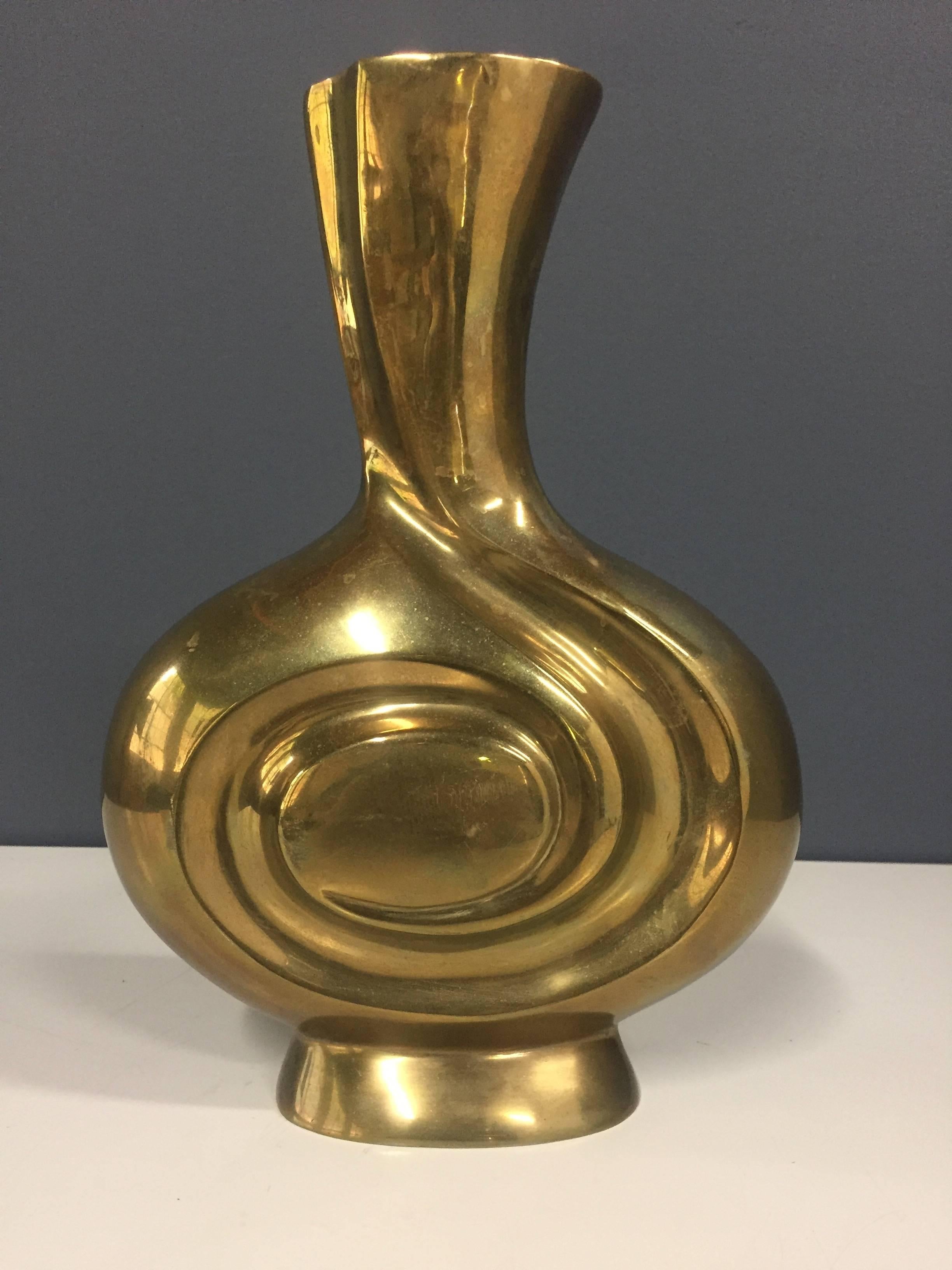 This brass vase, reminiscent of the work of Paloma Picasso is beautifully designed as was much of the work handled by Rosenthal Netter.