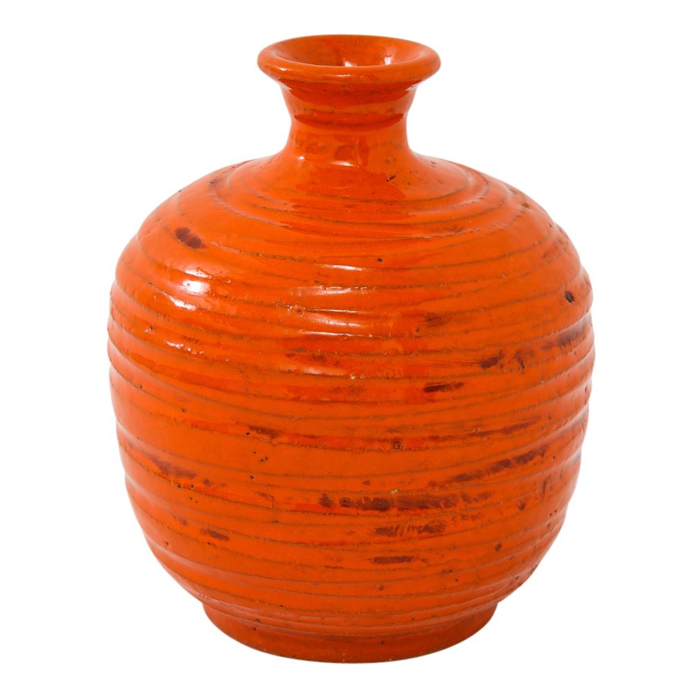 small orange vase