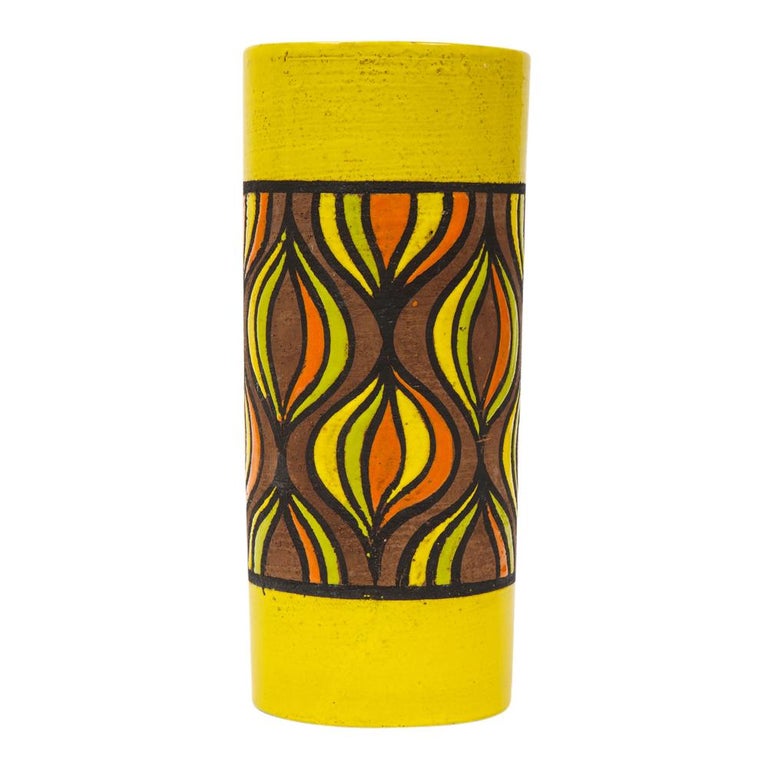 Rosenthal Netter vase, ceramic, yellow, orange and brown onion, signed. Tall chunky yellow and brown cylinder vase decorated with an organic onion pattern of yellow, orange, chartreuse and black. Retains original paper label on the underside which