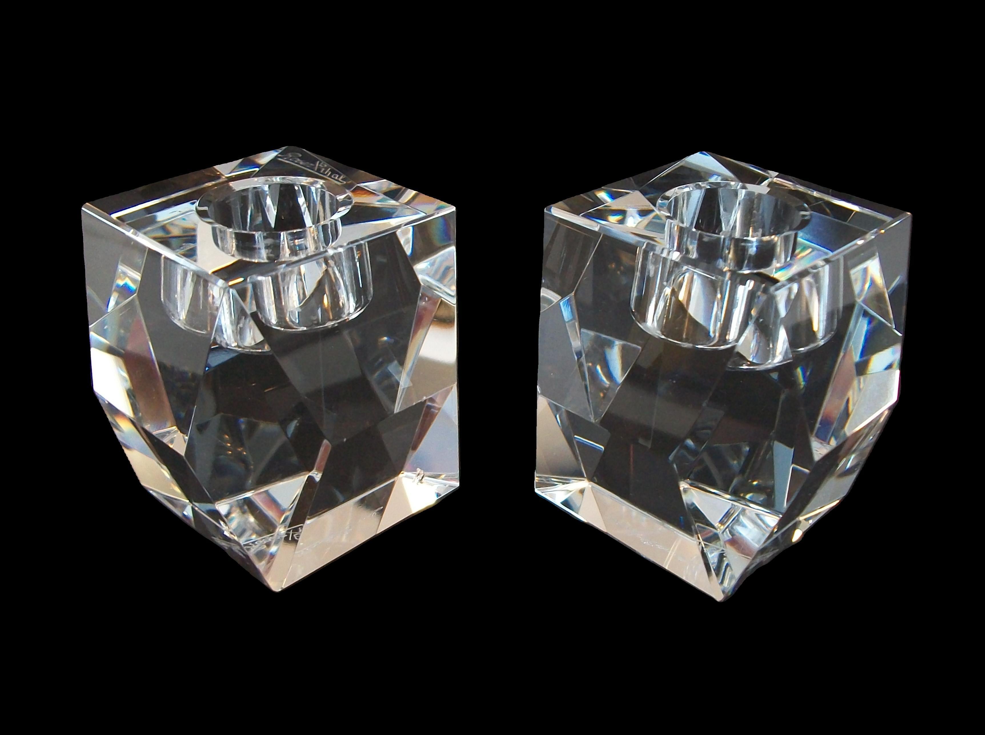 ROSENTHAL - Pair of vintage cut crystal candle holders - featuring polished facets to reflect the light - signed on the base of each candle holder - Germany - circa 1980's.

Excellent vintage condition - one minor base rim chip - no restoration -