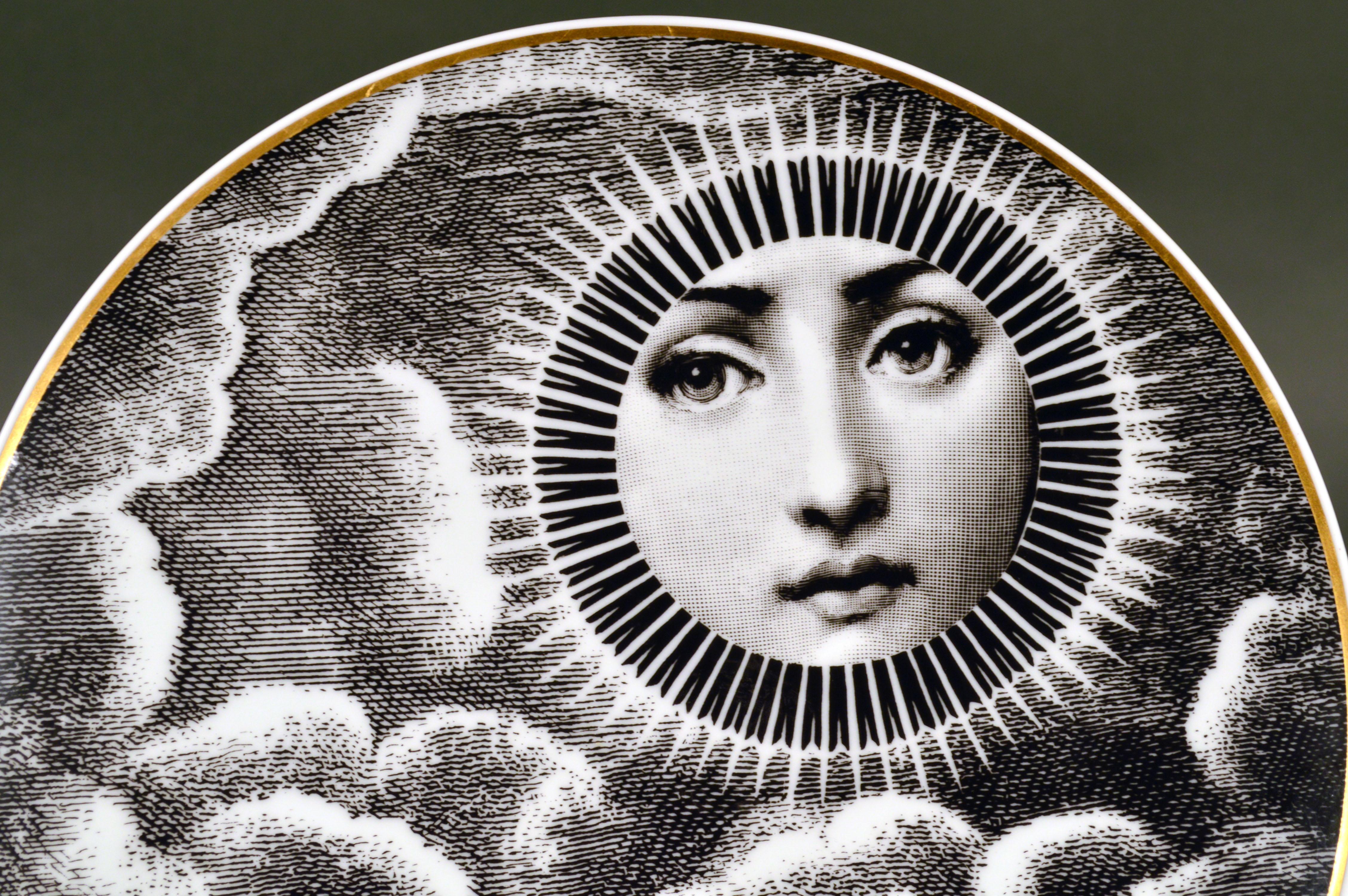 Rosenthal Piero Fornasetti themes and variations Motiv 18,
1980s.


The striking Rosenthal Fornasetti gold-rimmed black and white printed plate with the face of Lina Cavalieri.

Diameter: 9 1/4 inches

During the 1980s Rosenthal helped