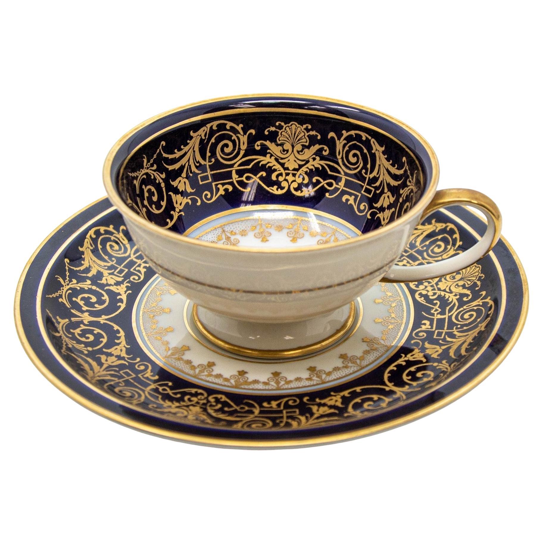 Taza de café y platillo de porcelana Rosenthal Demitasse negro y dorado 1940
