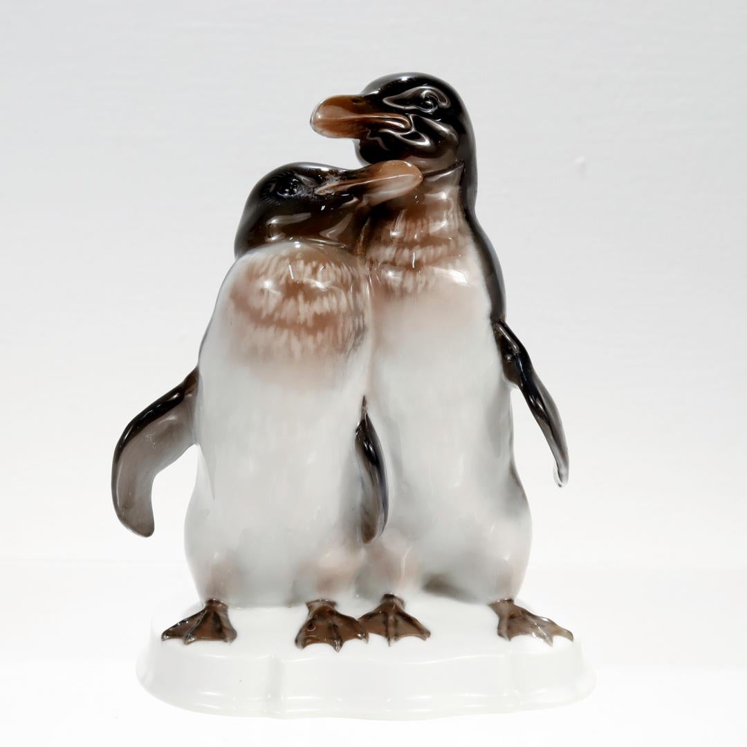 A fine mid-century Rosenthal porcelain figurine.

In the form of a pair of penguins huddling together with one another.

Entitled 