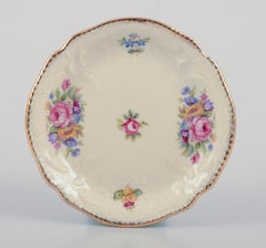 Rosenthal, "Sanssouci". Nine plates and three ashtrays. Approx. 1930s