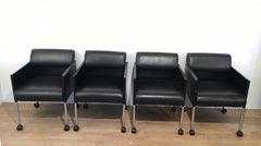 Set of 4 Black Lacquered and Leather Armchairs on Casters by Rosenthal. Cir 1970