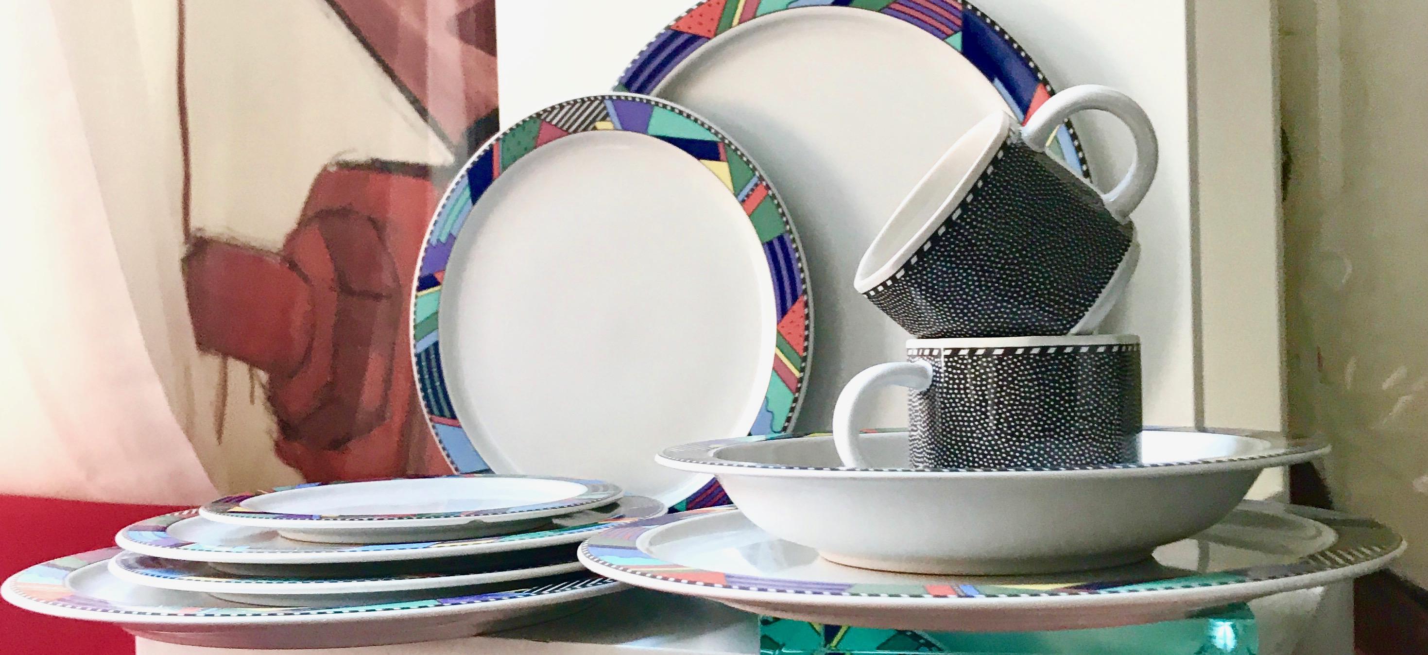 Starter set of the iconic postmodern Rosenthal Studio line collection by Barbara Brenner (1990). Set includes 11 pieces as follows:

3 dinner plates 
3 salad plates 
1 bread and vegan butter plates 
2 teacups 
2 bowls.