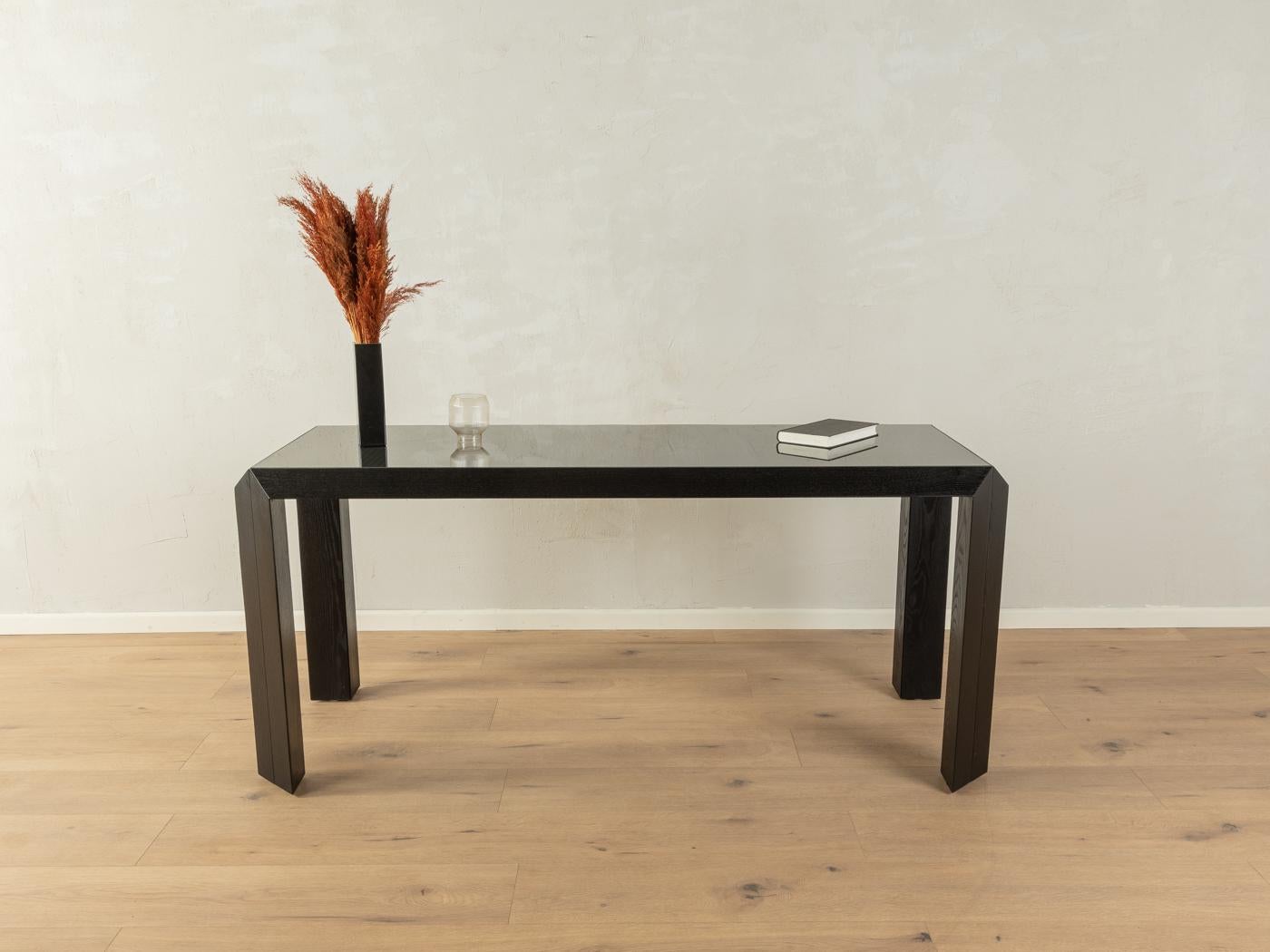 Talete side table from the 1980s by Gabriele Regondi & Pierluigi for Rosenthal. Solid black stained ash frame with embedded glass top.

Quality Features:
 very good workmanship
 high quality materials
 Made in Germany, design: Gabriele Regondi