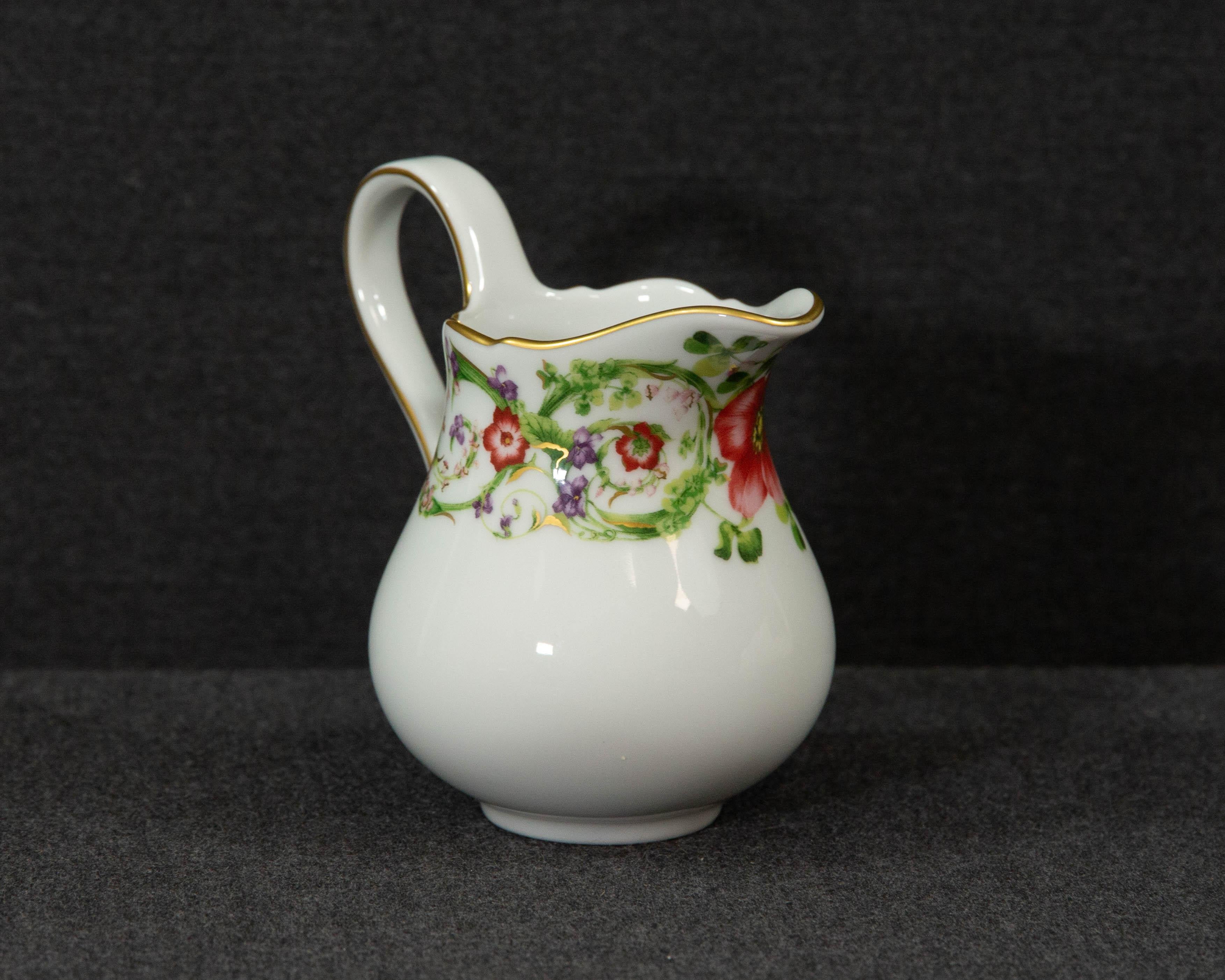 A creamer made by Rosenthal belonging to the series flower fantasy, designed by Versace.

The design was inspired by a floral pattern from Versace's fashion archives. The series is decorated with attractive sprays of foliage and flowers
