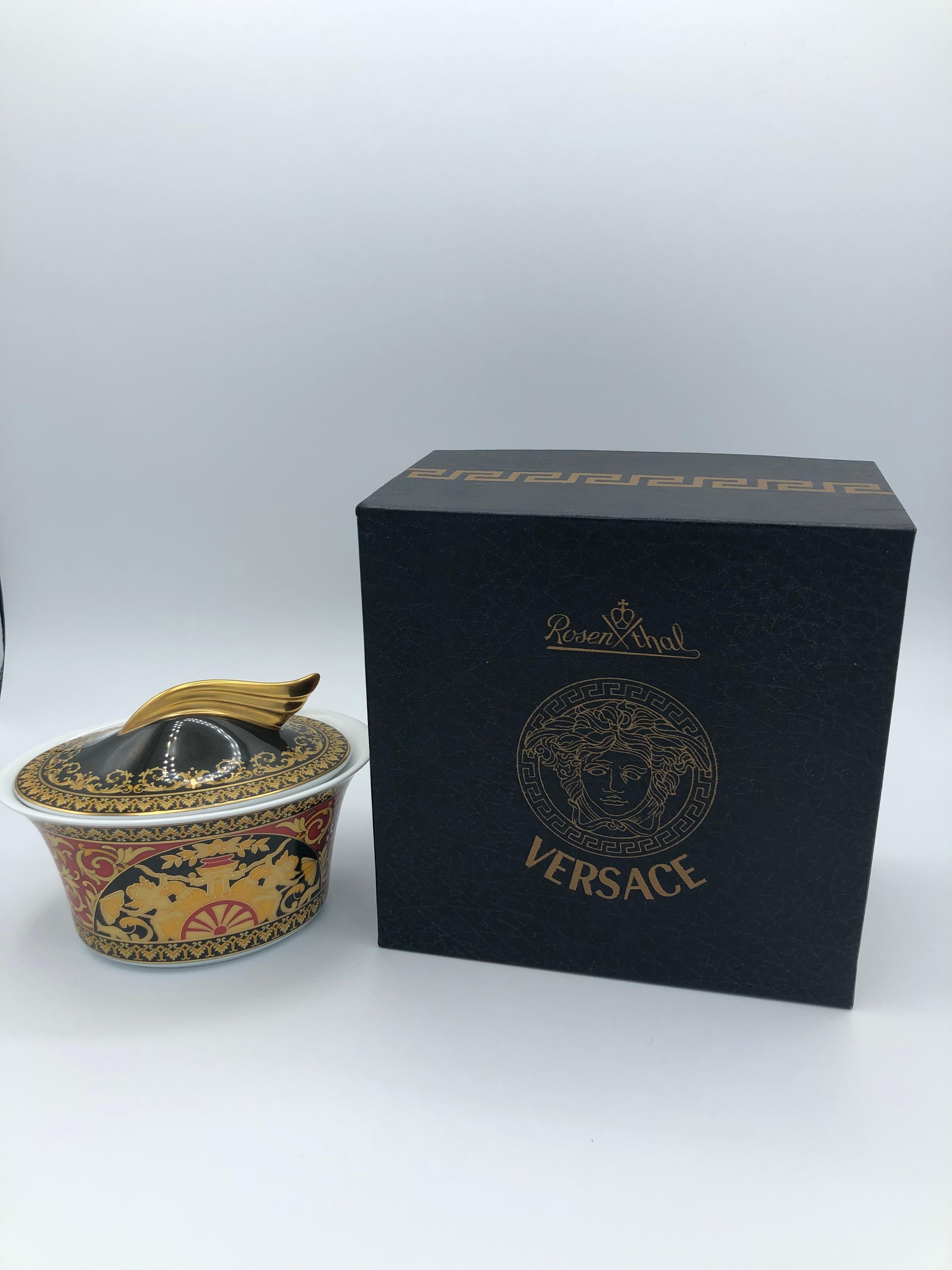 Rosenthal Versace Ikarus Medusa Sugar Bowl Design Paul Whimsical. Boxed. This stunning Versace dinnerware is called Medusa Red. It is produced using the finest porcelain creating a style that is best described as luxurious and glamorous. The covered