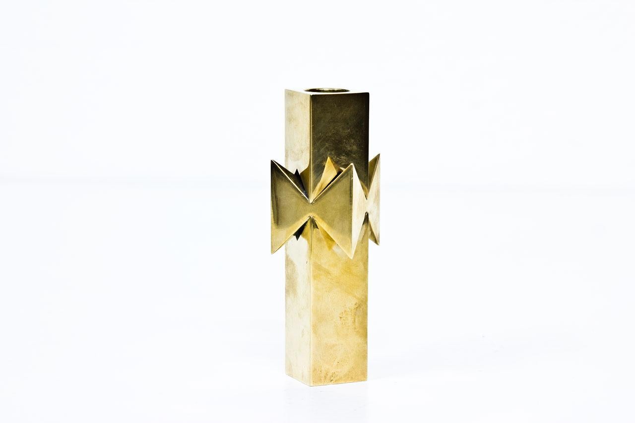 Heavy brass candleholder model “Rosett” designed by Pierre Forssell for Skultuna. Manufactured in Sweden during the 1960s. Engraved on the bottom.