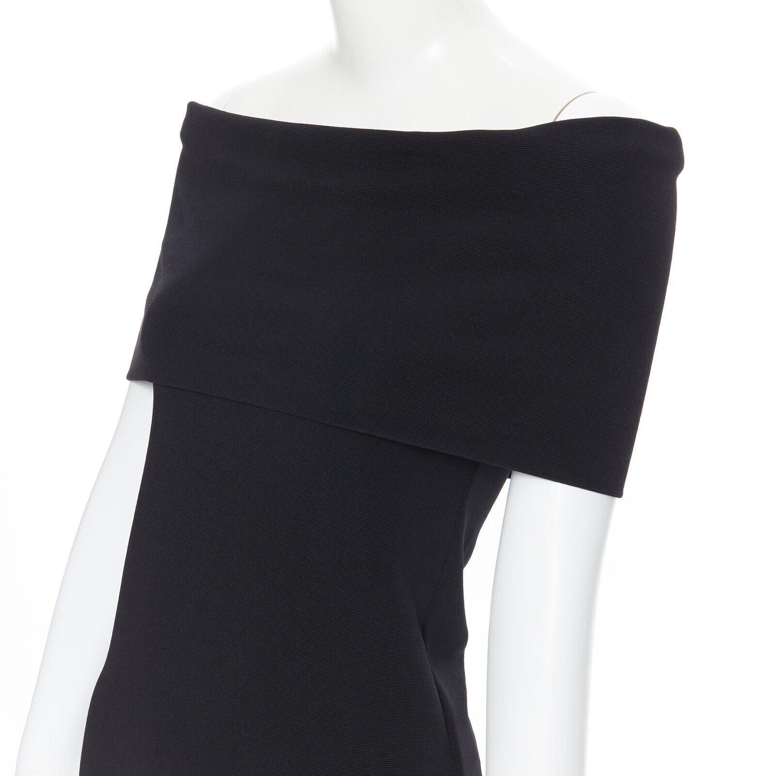 ROSETTA GETTY black knitted foldover banded off shoulder stretch top XS
Reference: LNKO/A01578
Brand: Rosetta Getty
Material: Nylon, Blend
Color: Black
Pattern: Solid
Extra Details: Stretch fit. Off shoulder band.
Made in: United