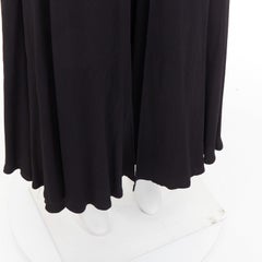 Rosetta Getty: pantalones harem negros de viscosa con pliegue invertido en la parte delantera y abertura lateral, talla US0 X