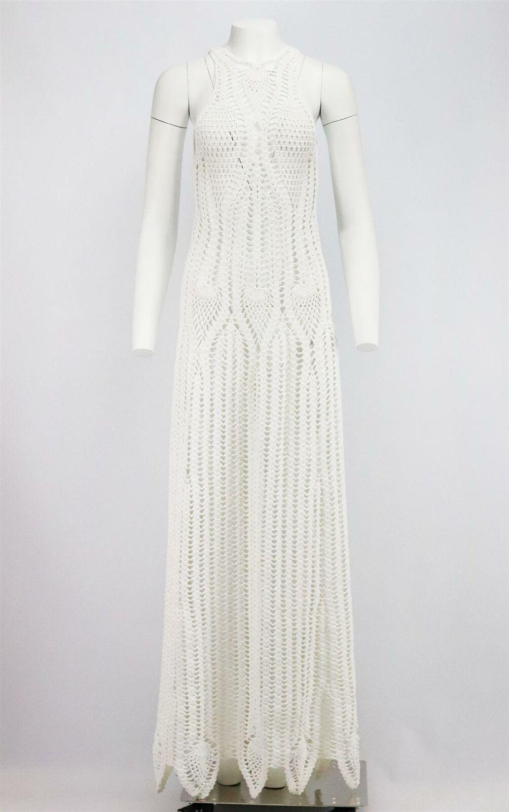 This dress by Rosetta Getty is hand-crocheted from glossy cotton-blend and includes a slip for coverage, this floor-length style is perfect for a summer evening or by the beach.
Ivory crocheted cotton-blend.
Concealed zip fastening at back.
69%