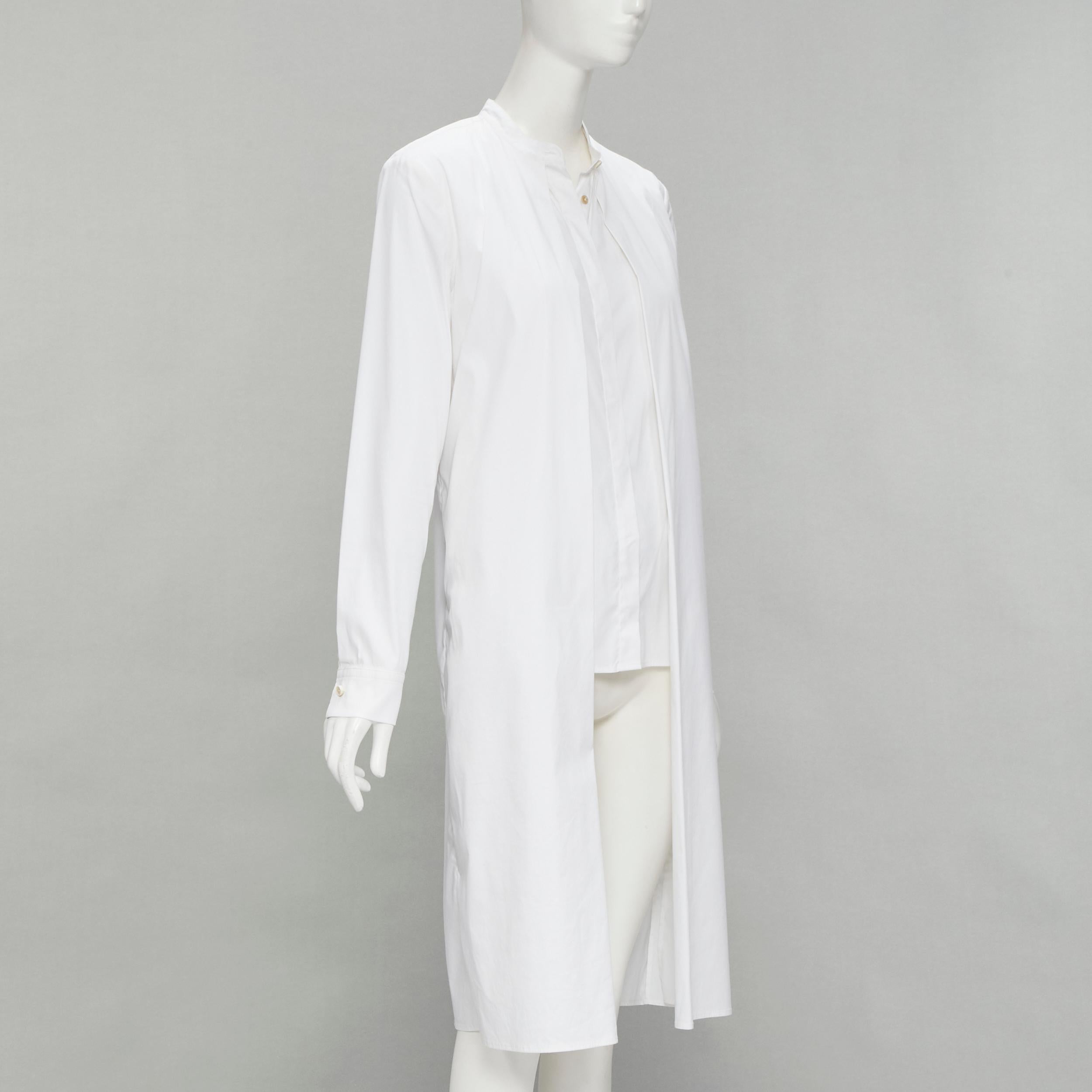 ROSETTA GETTY white cotton blend high low layered shirt US6 M
Brand: Rosetta Getty
Material: Cotton
Color: White
Pattern: Solid
Closure: Button
Extra Detail: Layered front high low design.
Made in: United States

CONDITION:
Condition: Excellent,