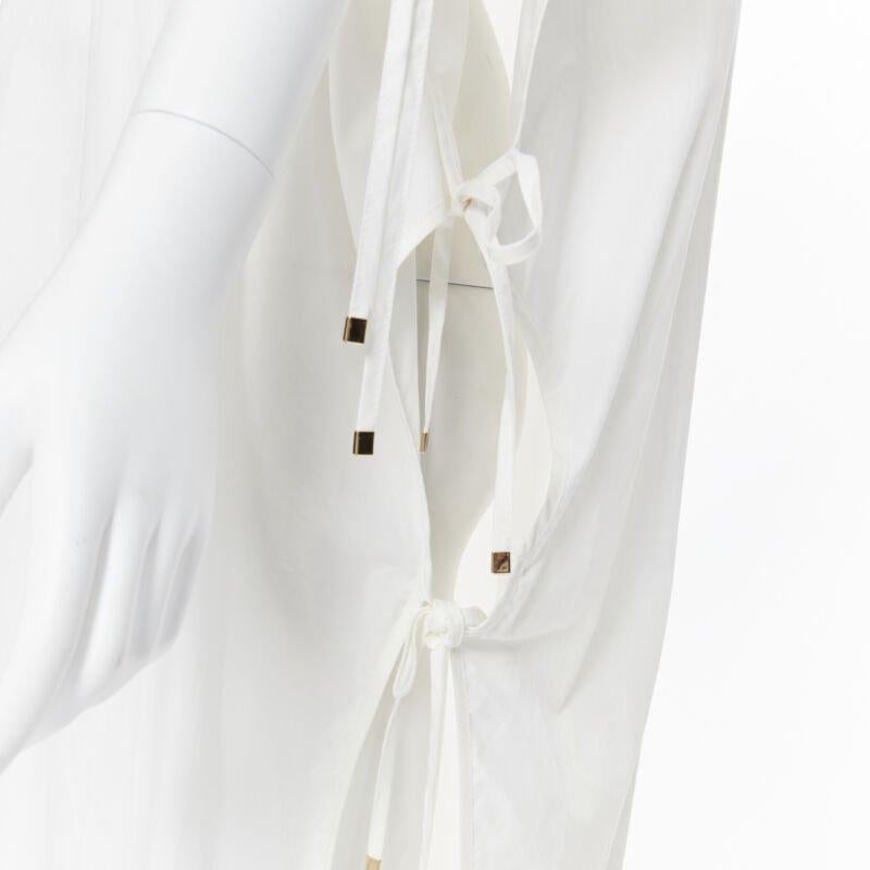 ROSETTA GETTY white cotton gold harware tie side high low casual dress XS
Reference: LNKO/A01649
Brand: Rosetta Getty
Material: Cotton
Color: White
Pattern: Solid
Extra Details: Tie side detail. Gold-tone hardware.

CONDITION:
Condition: Very good,