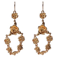 Boucles d'oreilles lustre rosette