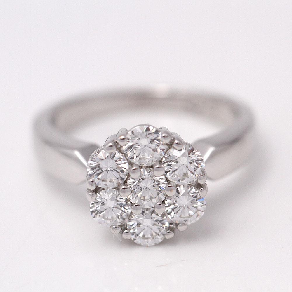 Women's Ring in White Gold  7x Brilliant Cut Diamonds with a total weight of approx. 0.70ct in G/VVS quality  1x 0.01ct brilliant set inside the ring  Size 9  18kt White Gold  4.81 grams.  This ring is in excellent condition  Ref:.D359573JC