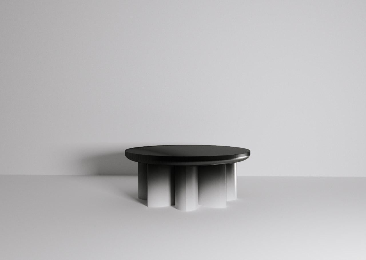 Rosette table by Jirí Krejcirík
Dimensions: 85 x 85 x 38 cm
Material: steel + aluminium


The tables entitled Odyssey and Kalokagathos represent the dialogue between the aesthetics of ancient Greece and the aesthetics of Slovene architect Josip
