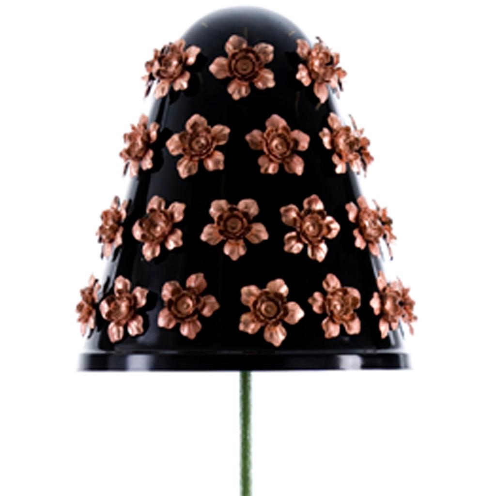 The crowning glory of the modern rosette tripod floor standing lamp is in the shade. The shade is spun aluminium spray coated black, to this are attached shiny copper plated steel flowers. The shade color can be sprayed any Pantone color.
The steel