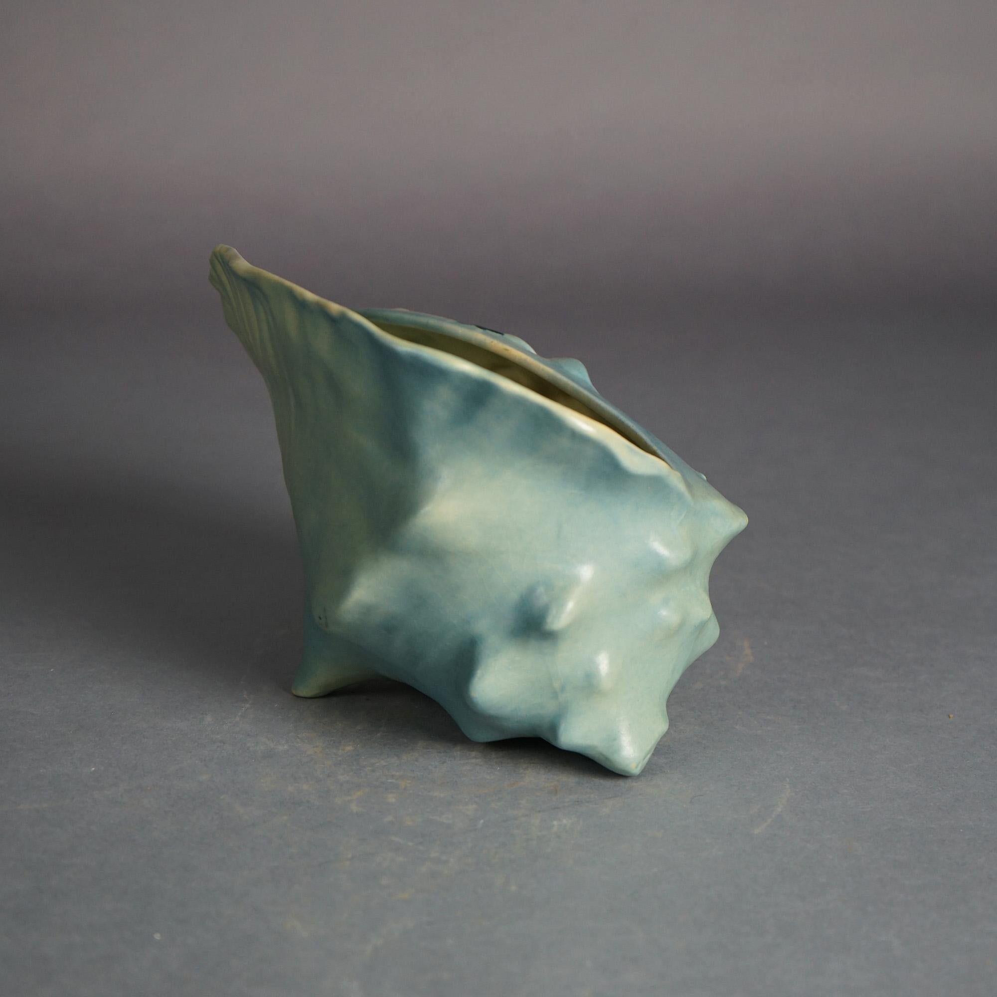 Roseville Art Pottery Blue Conch Shell With Magnolia Pattern C1943

Measures - 6.5