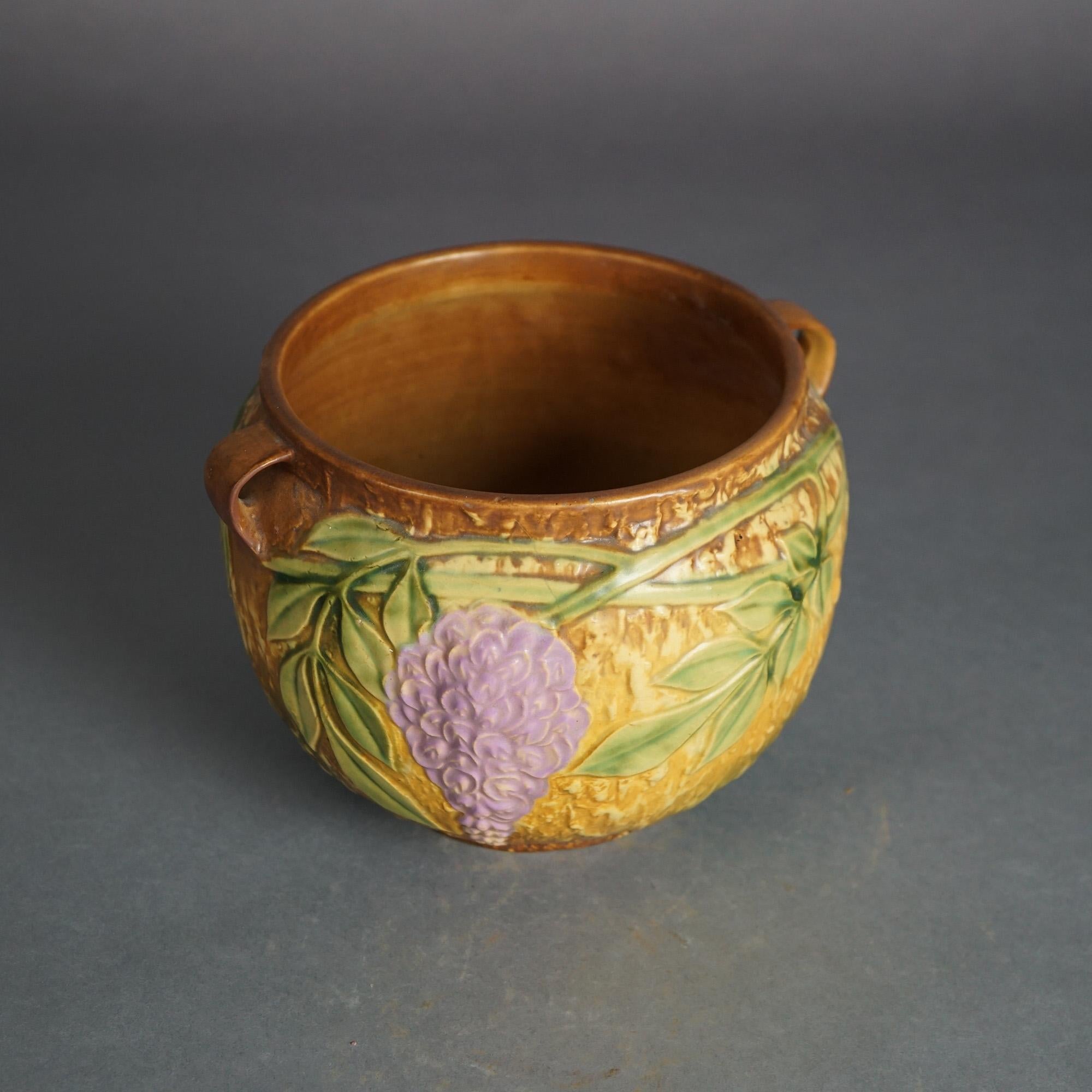 Roseville Art Pottery Brown Jardiniere With Wisteria Pattern C1933

Measures - 6.25