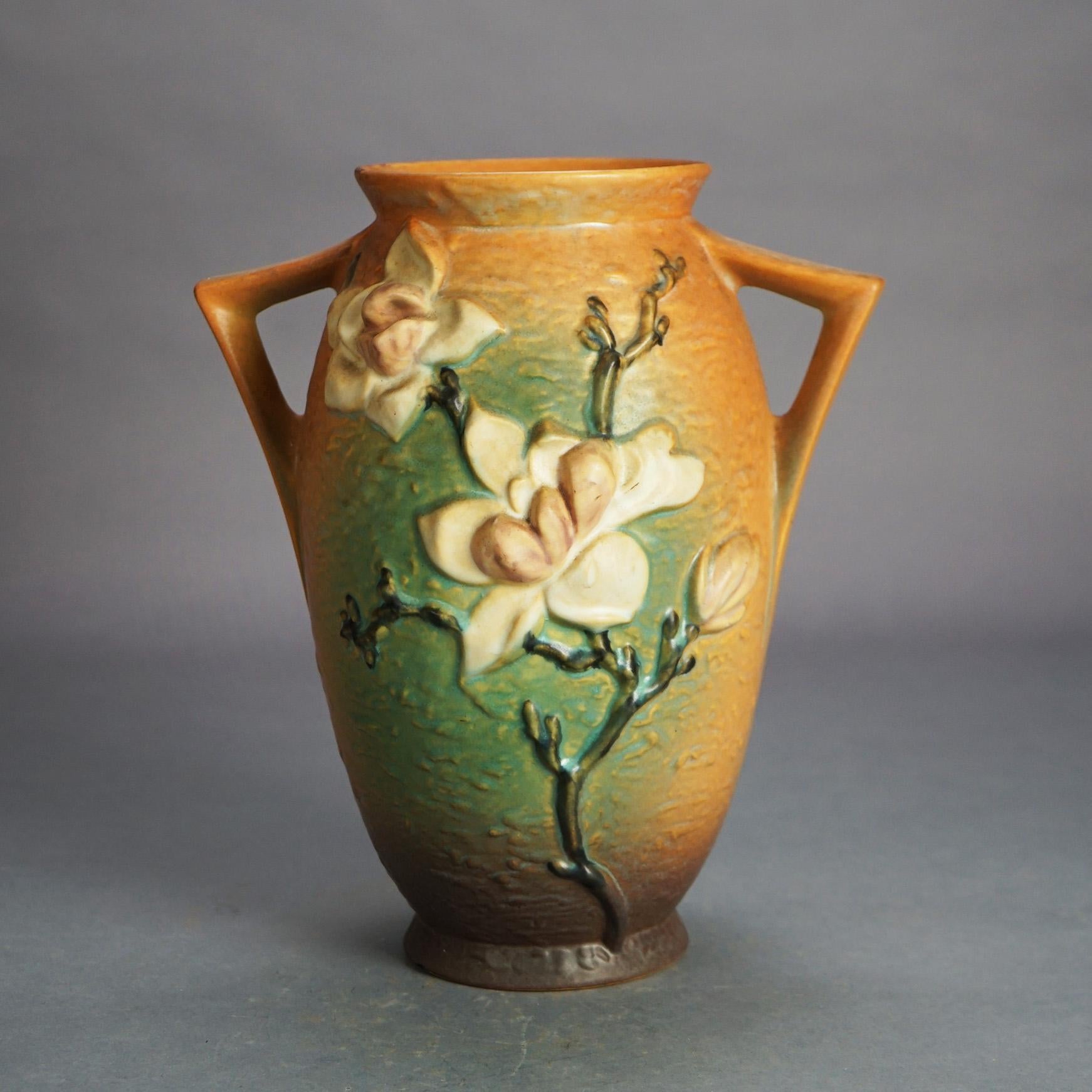Roseville Art Pottery Brown Vase with Magnolia Pattern Mid 20thC

Measures - 12.5