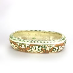 Roseville Art Pottery Cuenco central con dibujo de Donatello Mediados del siglo XX