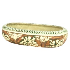 Roseville Art Pottery Cuenco central con dibujo de Donatello Mediados del siglo XX