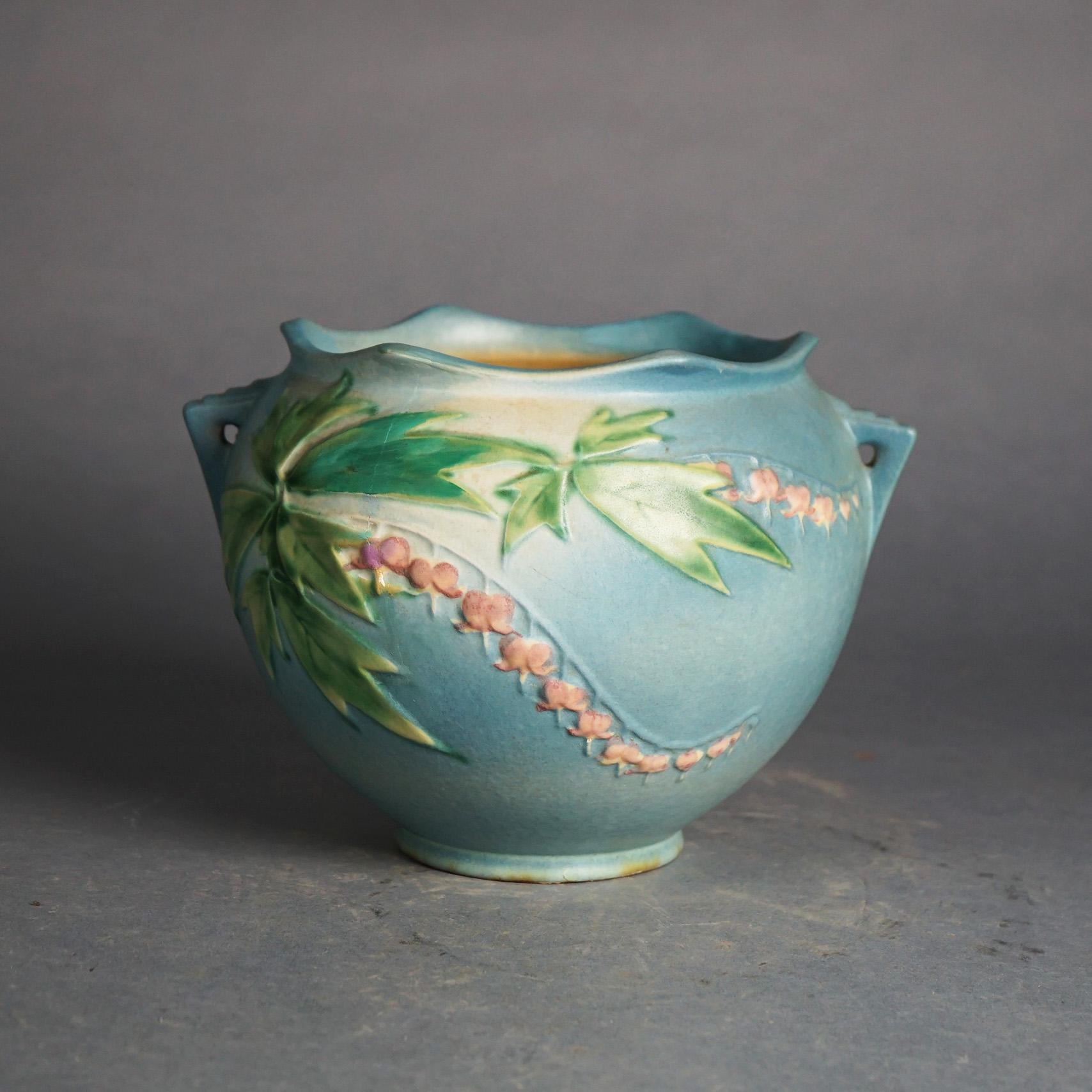 Roseville Art Pottery Jardiniere, Bleeding Heart, Signed, C1940

Measures - 7.25