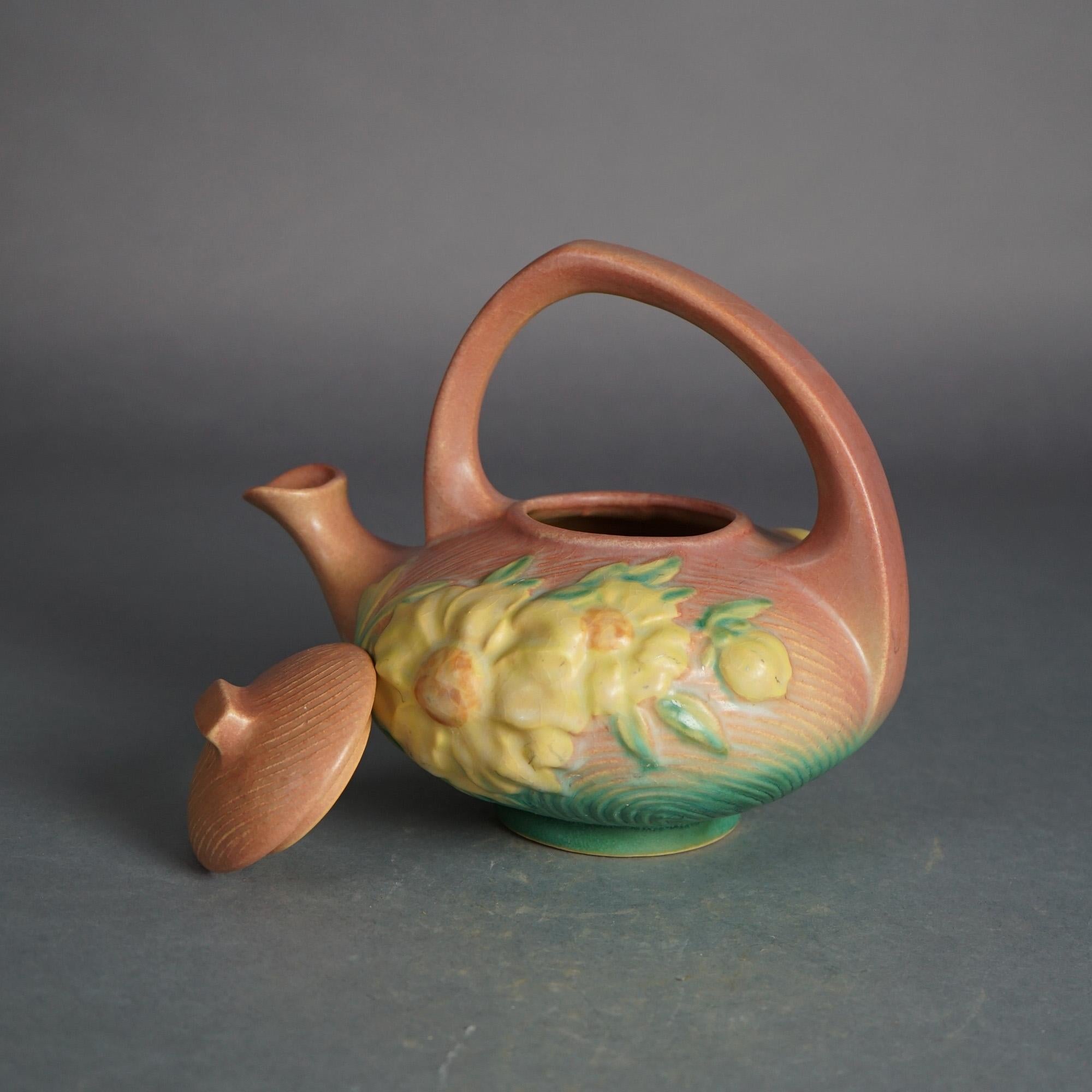 Roseville Art Pottery Pink Teapot with Yellow Peony Pattern C1942

Measures - 8.5